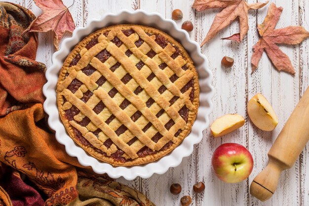 Delicious pie and leaves arrangement