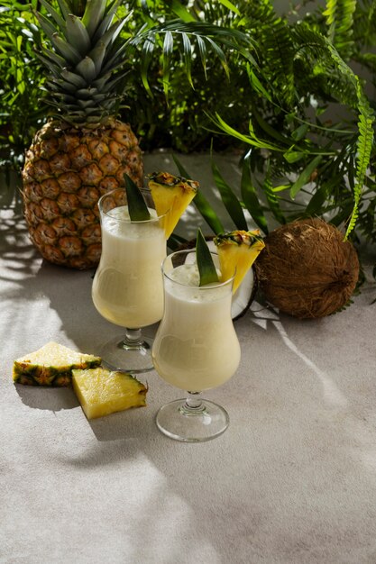 delicious pina colada cocktail  with leaves