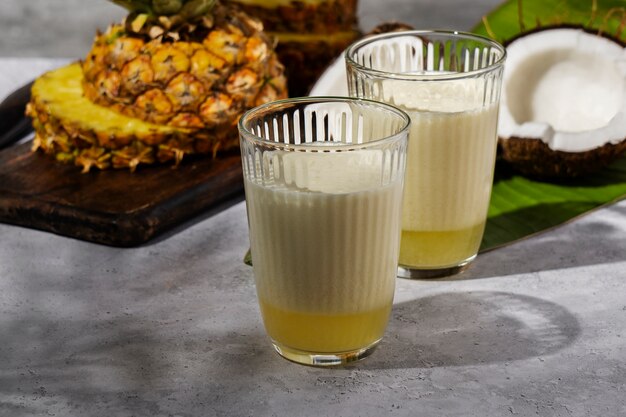 delicious pina colada cocktail  with pineapple