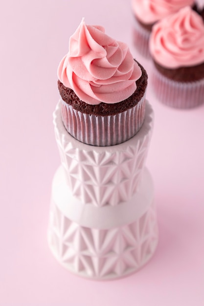 Delicious pink cupcake high angle