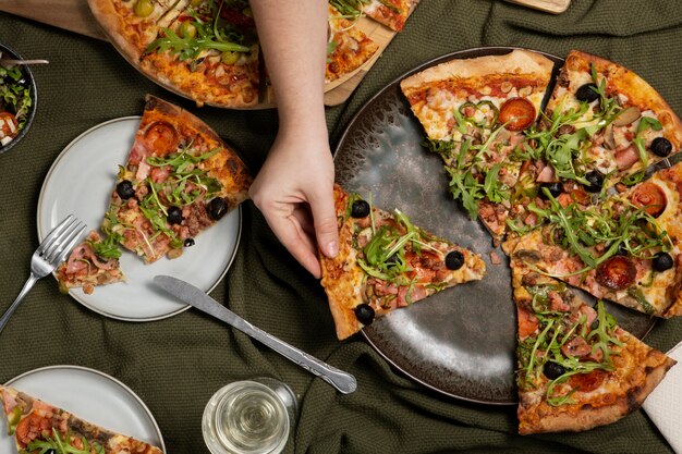 Delicious pizza arrangement flat lay