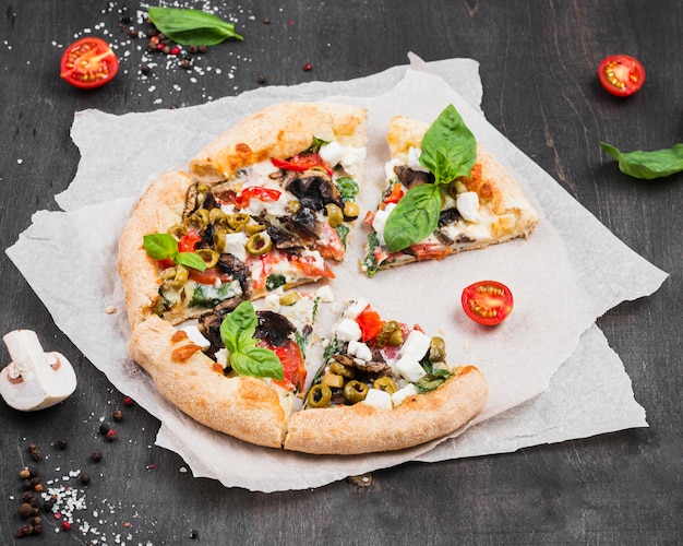 Delicious pizza with vegetables arrangement