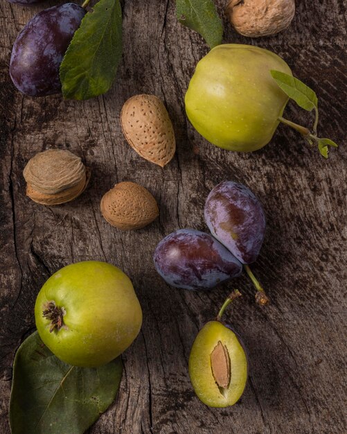 Delicious plums arrangement above view