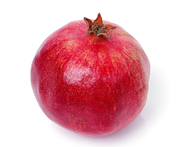 Delicious pomegranate on white
