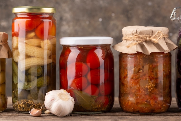 Delicious preserved food in jars arrangement