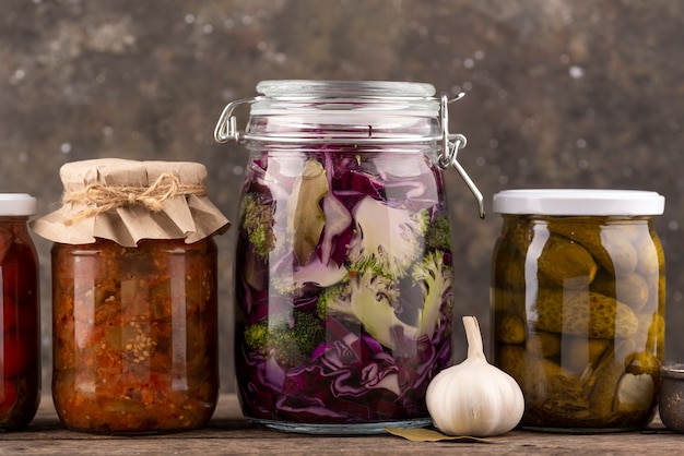 Delicious preserved food in jars
