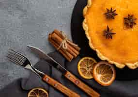 Free photo delicious pumpkin pie and dried lemon slices