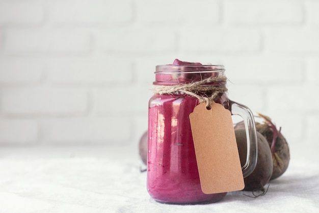 Delicious purple smoothie in jar mug