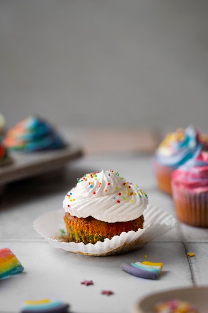 Delicious rainbow cupcake still life