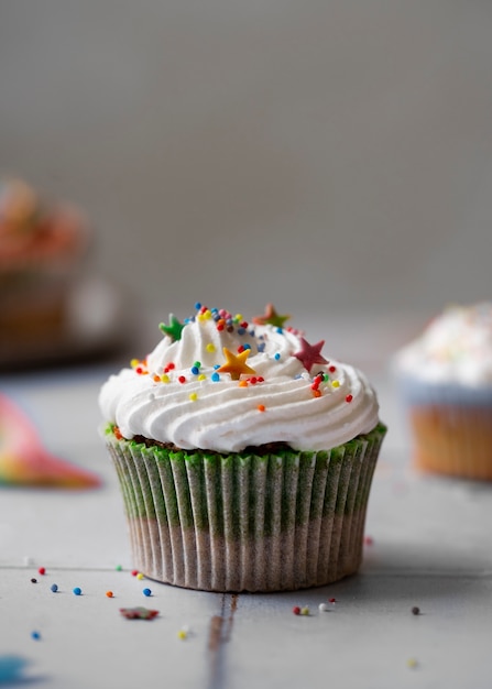 Delicious rainbow cupcake still life