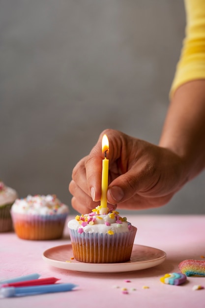 Free photo delicious rainbow cupcakes still life