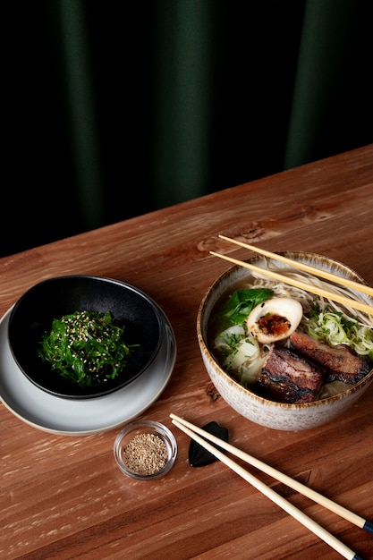 Delicious ramen with seaweed salad concept