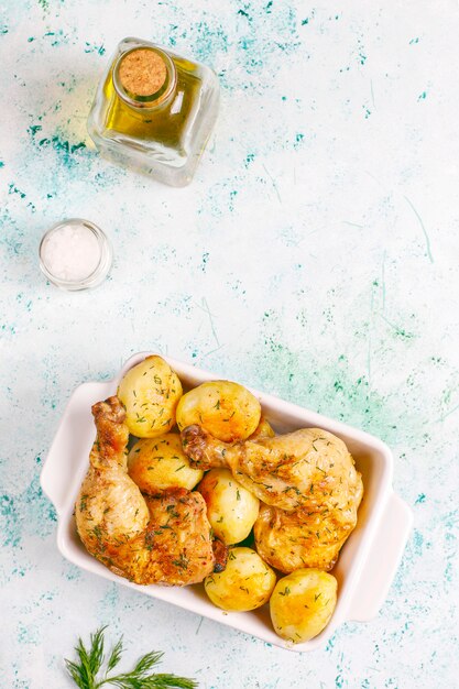 Delicious roasted young potatoes with dill and chicken
