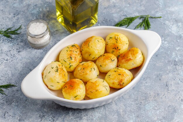 Delicious roasted young potatoes with dill,top view