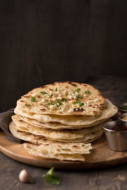 Delicious roti arrangement on the table with copy space