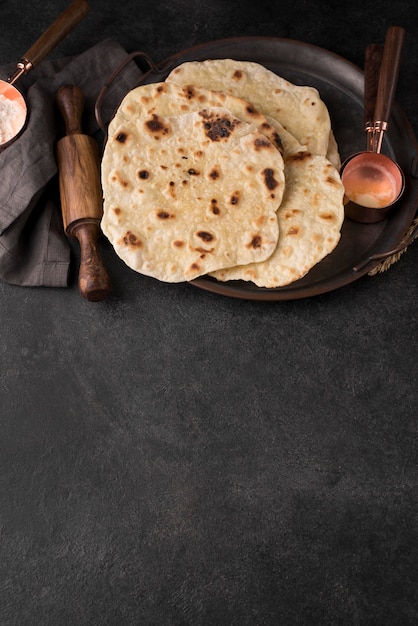 Delicious roti assortment on the table with copy space