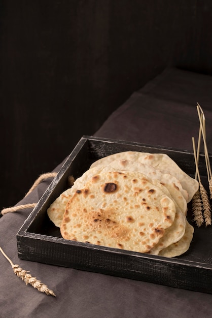 Free photo delicious roti assortment on the table with copy space