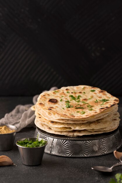 Delicious roti assortment on the table with copy space