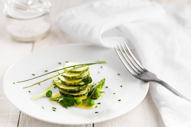 Delicious salad on a white plate arrangement