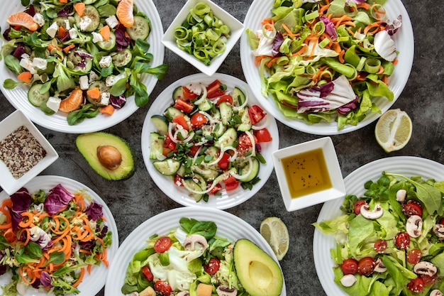 Delicious salad with avocado on tabe