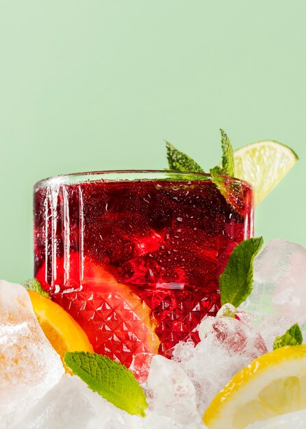 Delicious sangria drink with lemon and leaves