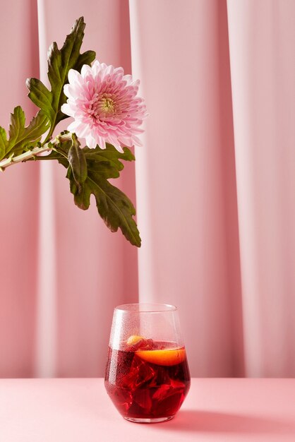 Delicious sangria drink with pink flower