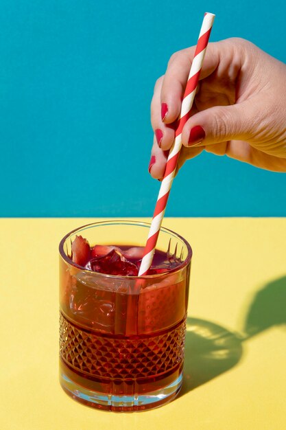 Delicious sangria drink with straw