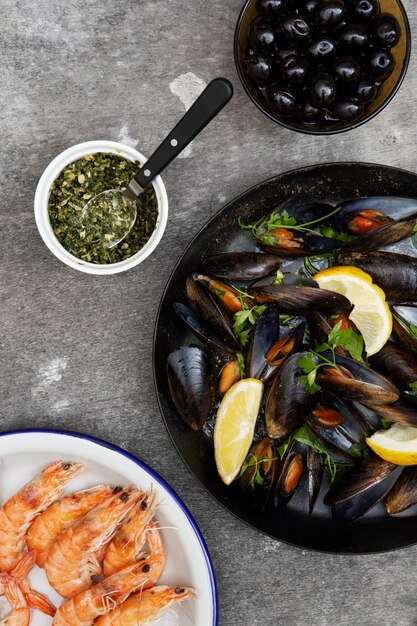 Delicious seafood on table arrangement flat lay