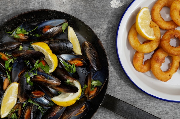 Delicious seafood on table arrangement top view