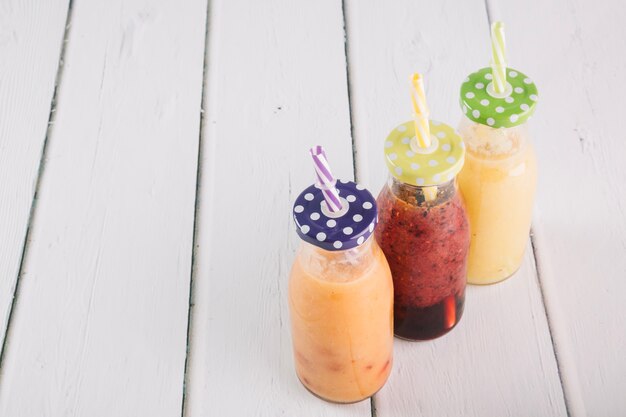 Delicious smoothie in bottles