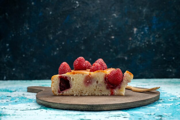 delicious strawberry cake sliced and whole delicious cake on bright-blue , berries cake sweet bake dough