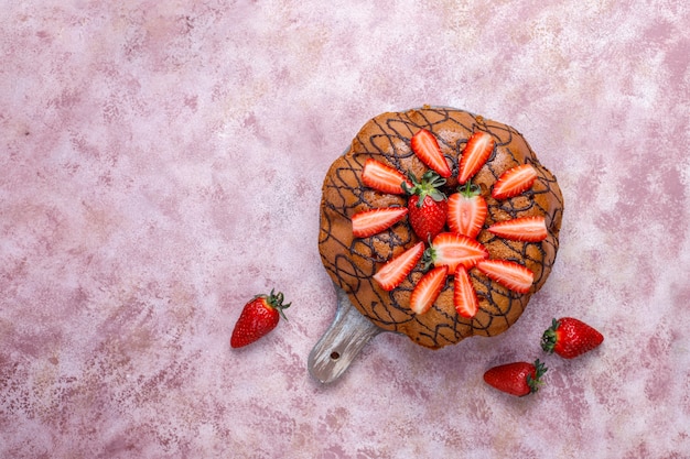 Delicious strawberry chocolate cake with fresh strawberries,top view