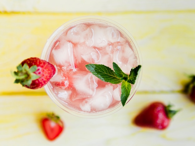 Delicious strawberry drink with mint and ice