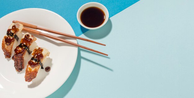 Delicious sushi and soy sauce with copy space