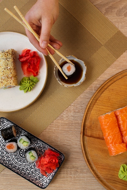 Free photo delicious sushi on table flat lay