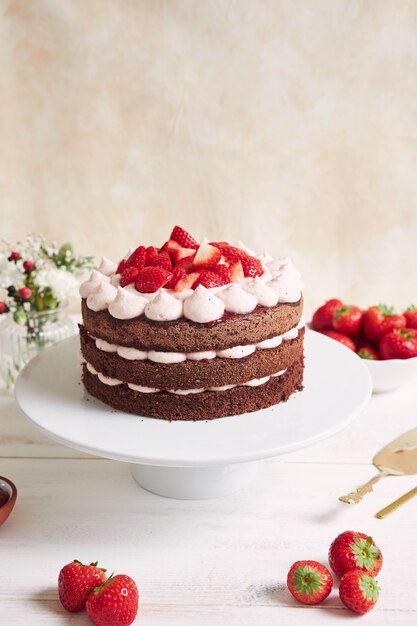 Delicious and sweet cake with strawberries and basier on a plate