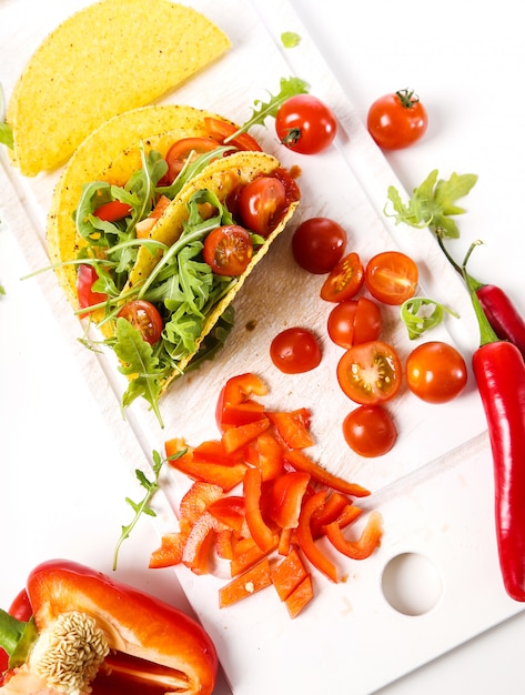 Delicious taco on wood plate