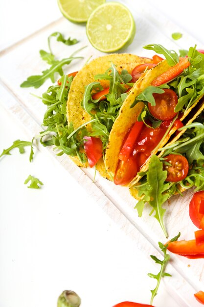 Delicious taco on wood plate