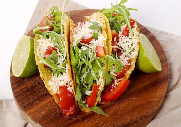 Delicious taco on wood plate