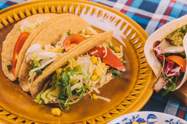 Free photo delicious tacos with ground beef in plate