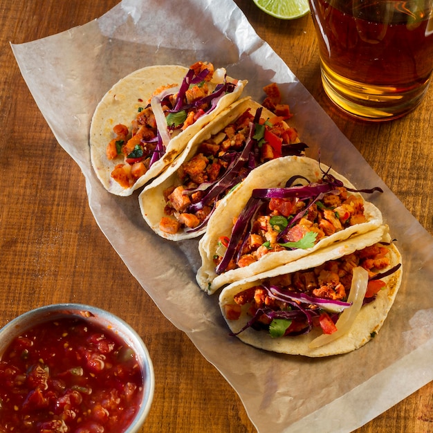 Delicious tacos with sauce arrangement