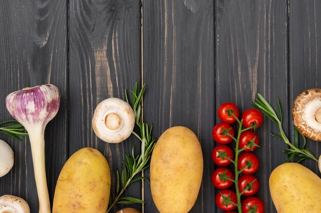Delicious vegetables on wooden background