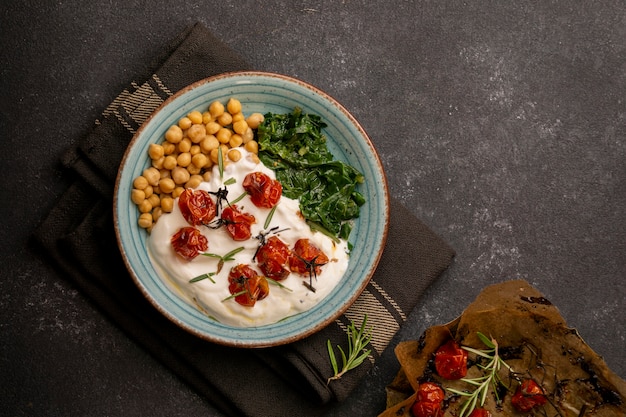 Delicious yougurt meal with chickpeas and dried tomatoes