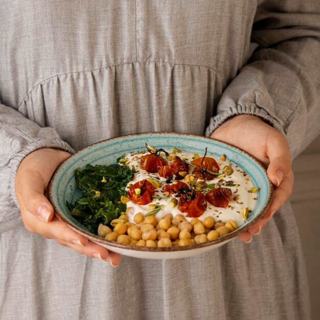 Delicious yougurt meal with chickpeas and dried tomatoes