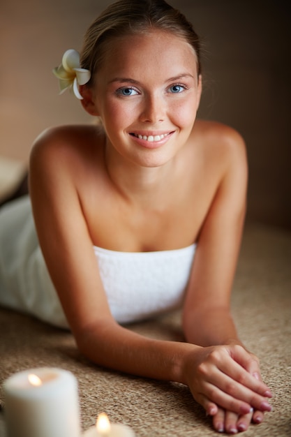 Delighted woman in a spa center