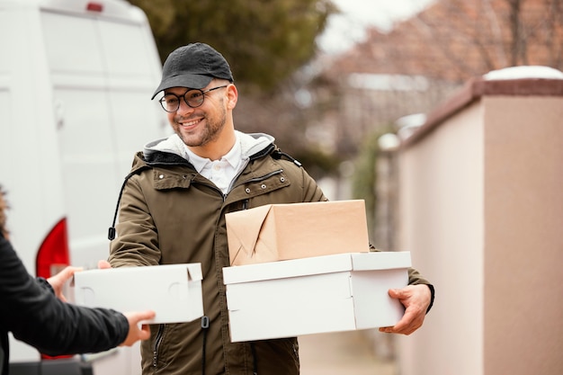 Delivery male with packages