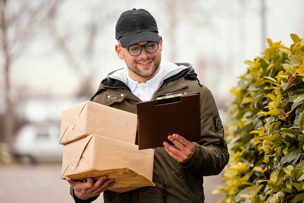 Free photo delivery male with packages