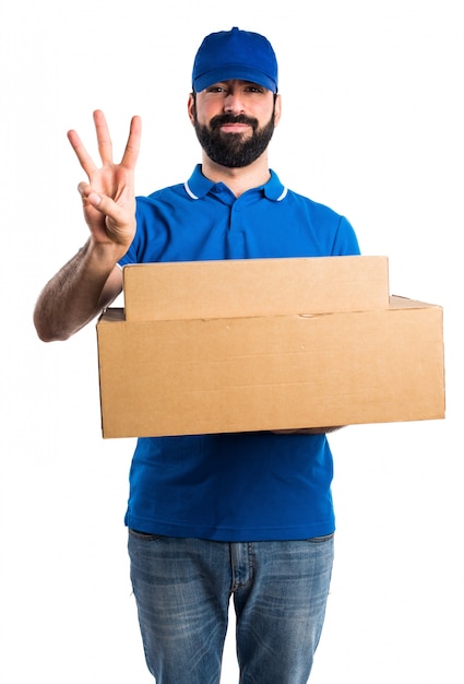 Free photo delivery man counting three