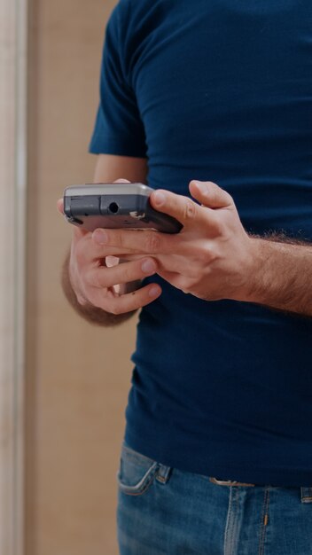 Delivery man delivering food order takeaway to businesswoman in startup company office