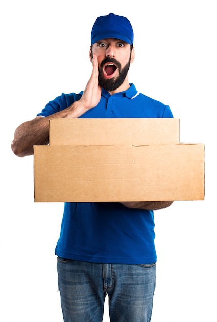 Delivery man doing surprise gesture